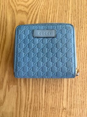 Gucci Powder Blue Embossed GG Zip-Around Wallet
